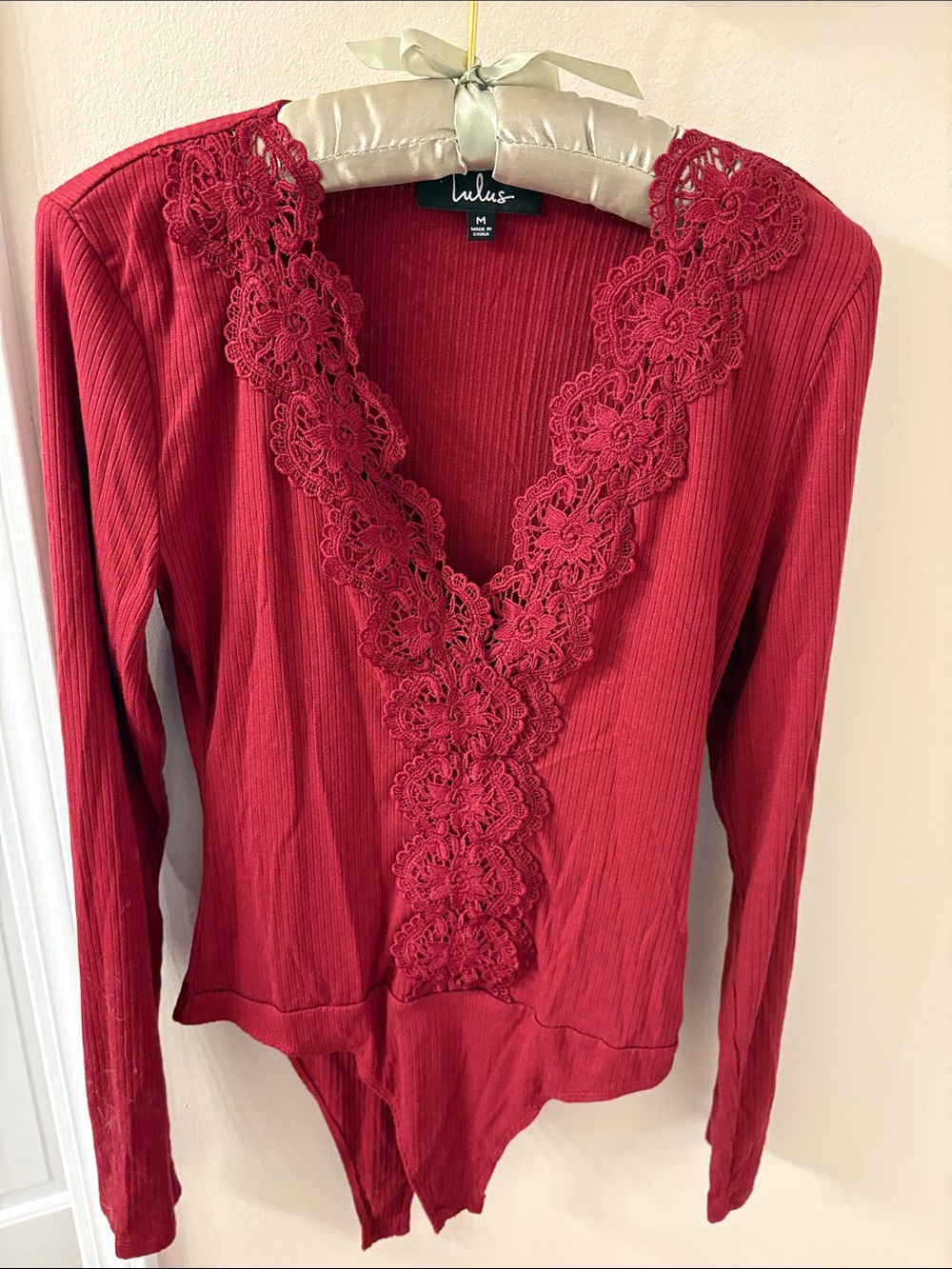 Lulu's Burgundy Lace-Trim Ribbed Long Sleeve Bodysuit